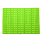 Green Collory silicone baking mat for making bone-shaped homemade dog treats