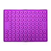 Purple Collory silicone baking mat for making doughnut-shaped homemade dog treats