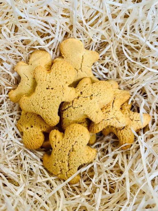 Life of Riley gingerbread people on a straw background