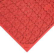 Red SodaPup dog lick mat with a Christmas tree pattern - Christmas dog gift